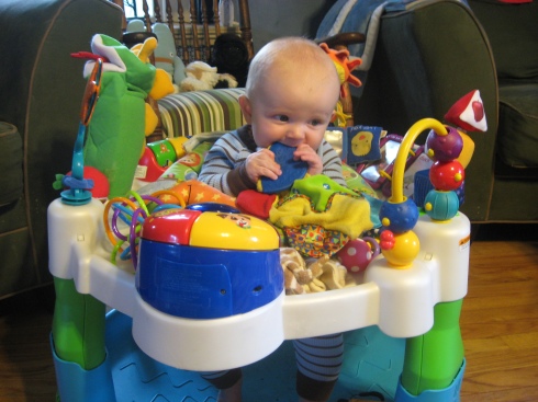 The ratio of toys to baby is about 100 to 1. 